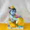 Lord Krishna Eating Makhan(butter) - Polyresin