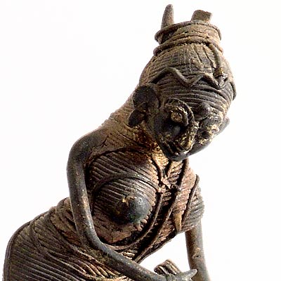 Lady Washing Clothes - Dhokra Statuette